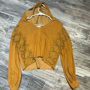 Women’s hoodie, mustard, color, beautiful detailing in the front